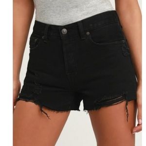 Free People black denim shorts